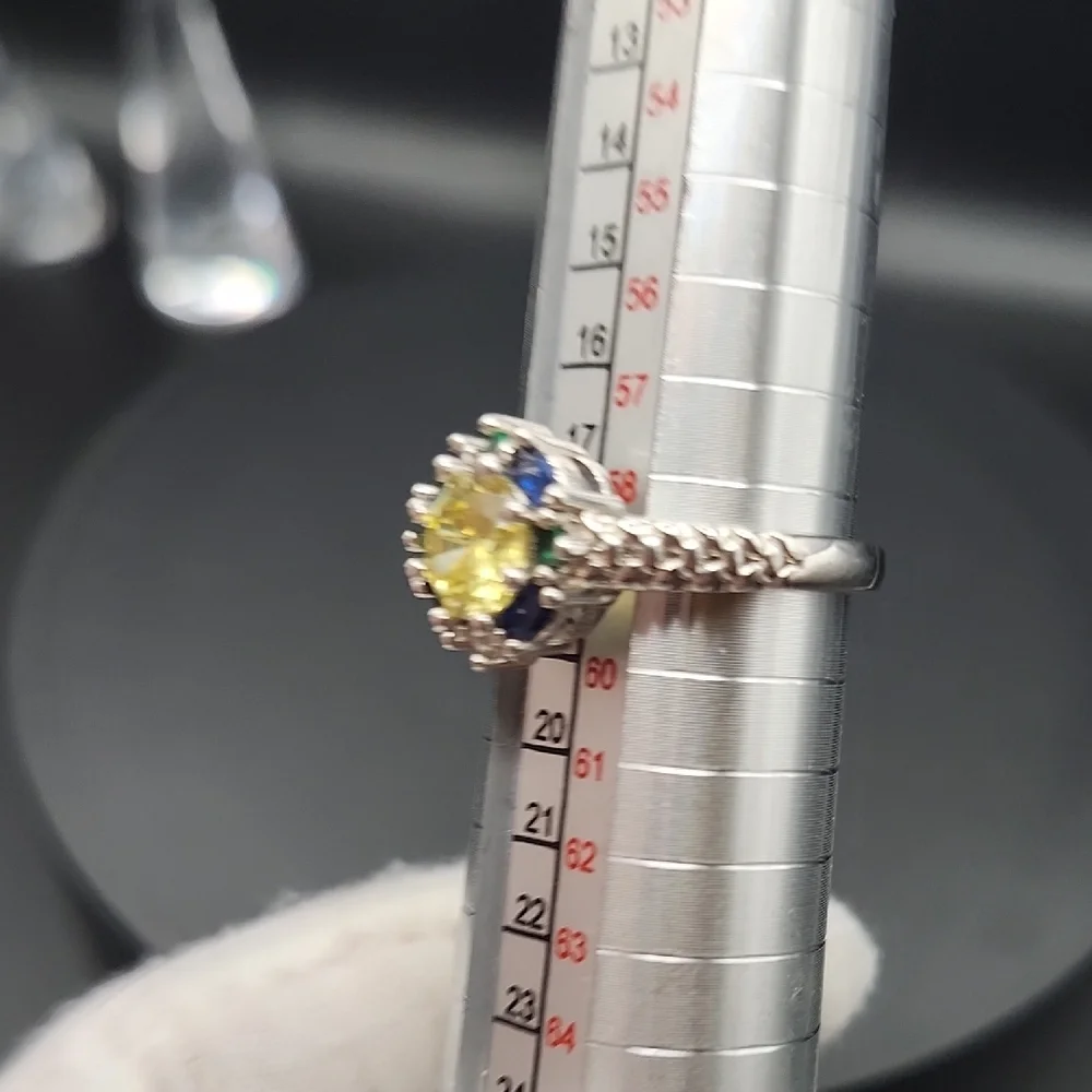 Elegant Silver Ring with Yellow and Blue Stones